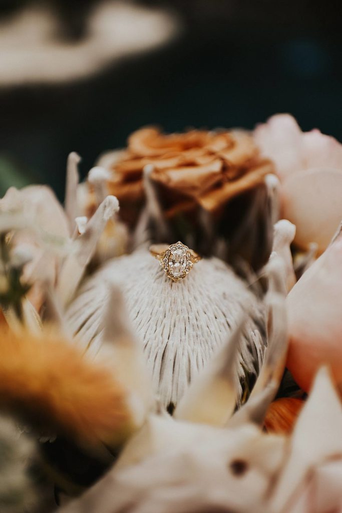 Engagement ring on dinosaur flower detail at the Historic Walton House in Homestead, Florida