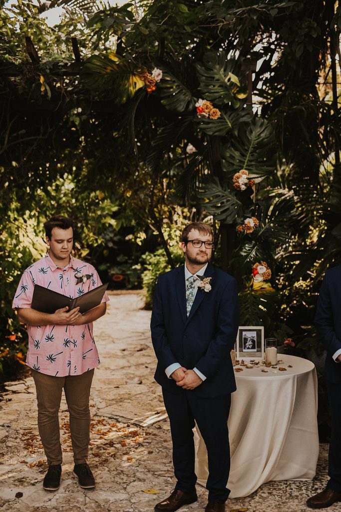 Groom waiting at the alter at the historic walton house in homestead florida