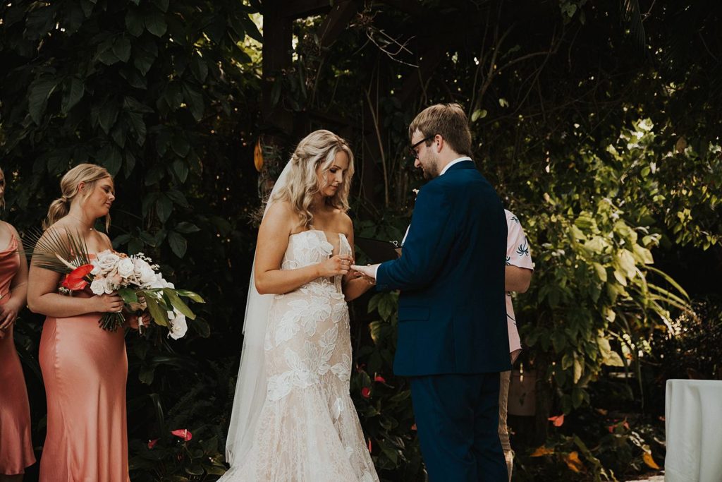 Bride and groom at the alter at the historic walton house in homestead florida