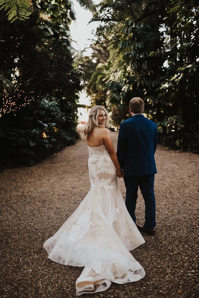Tropical bride and groom portrait at the historic walton house in homestead florida
