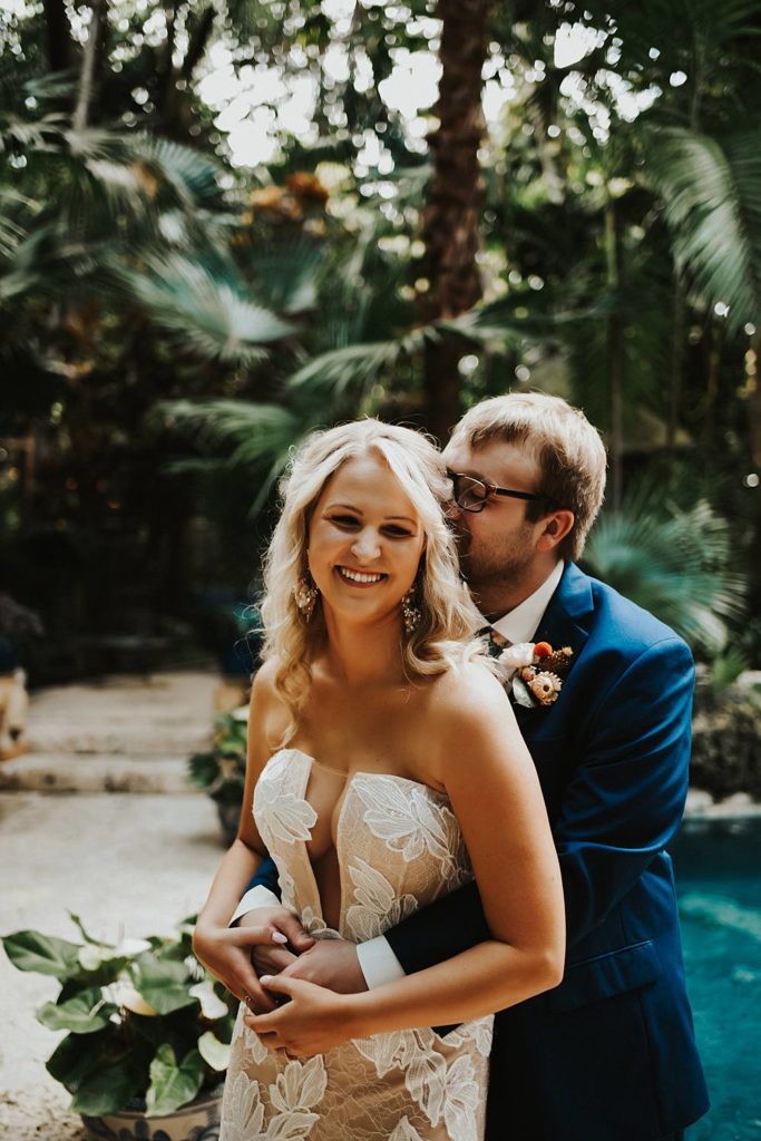 Tropical bride and groom portrait at the historic walton house in homestead florida