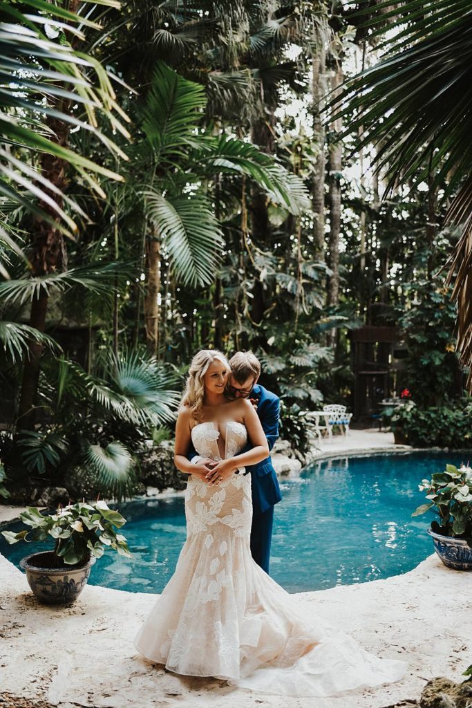 Tropical bride and groom portrait at the historic walton house in homestead florida