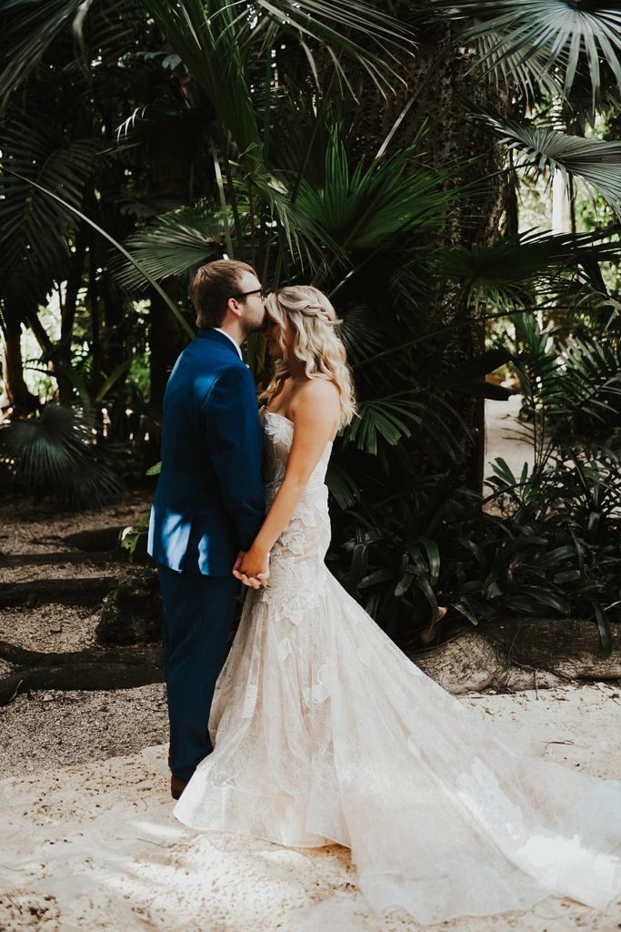 Tropical bride and groom portrait at the historic walton house in homestead florida