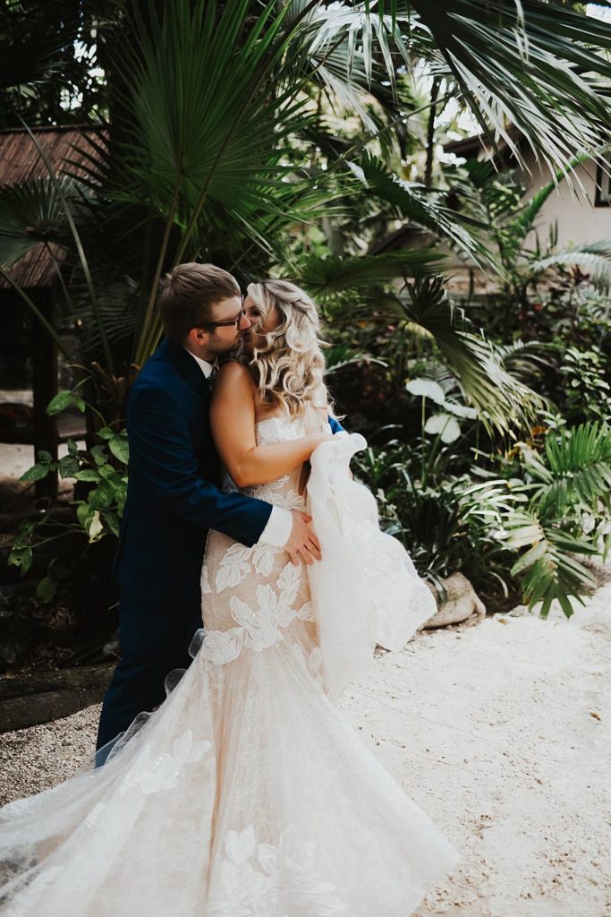 Tropical bride and groom portrait at the historic walton house in homestead florida