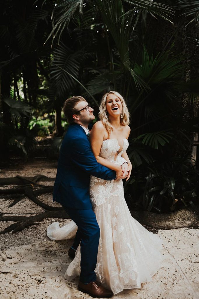 Tropical bride and groom portrait at the historic walton house in homestead florida