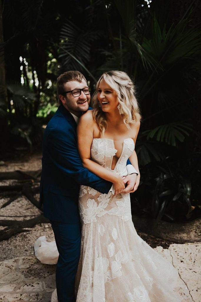 Tropical bride and groom portrait at the historic walton house in homestead florida