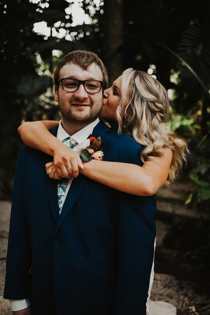 Tropical bride and groom portrait at the historic walton house in homestead florida