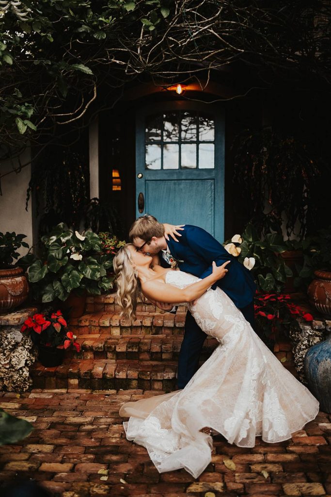Tropical bride and groom portrait at the historic walton house in homestead florida
