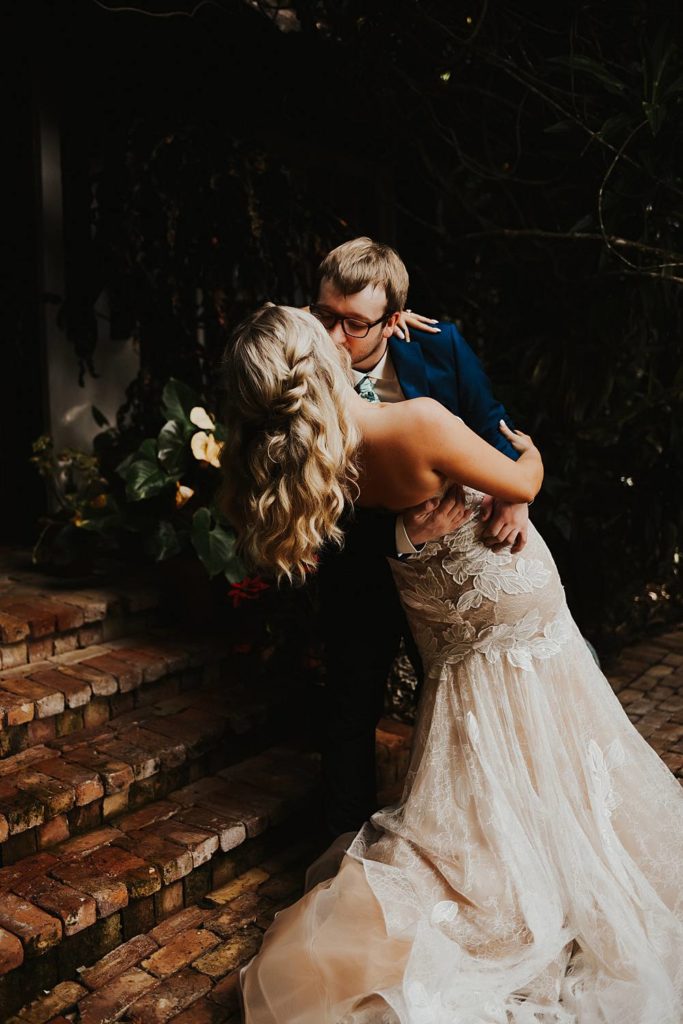 Tropical bride and groom portrait at the historic walton house in homestead florida