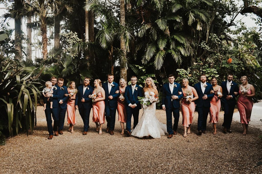 Tropical bridal party portrait at the historic walton house in homestead florida