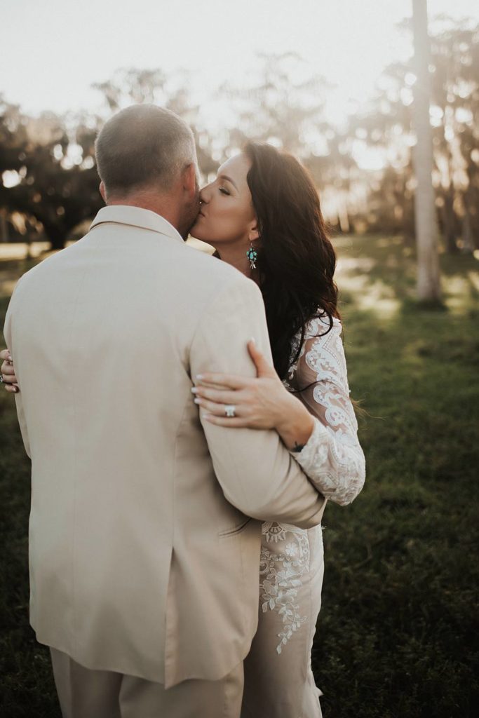 Western-inspired authentic Bride and groom portraits in pasture in okeechobee florida
