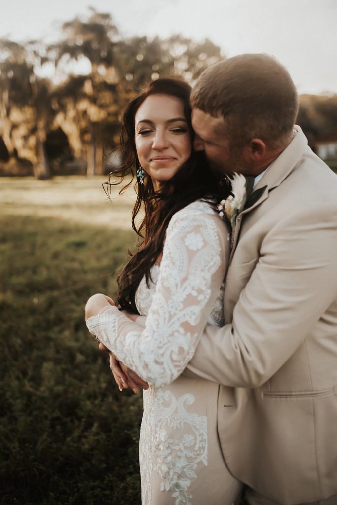 Western-inspired authentic Bride and groom portraits in pasture in okeechobee florida