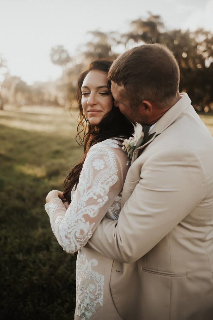 Western-inspired authentic Bride and groom portraits in pasture in okeechobee florida