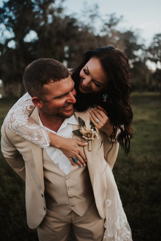 Western-inspired authentic Bride and groom portraits in pasture in okeechobee florida