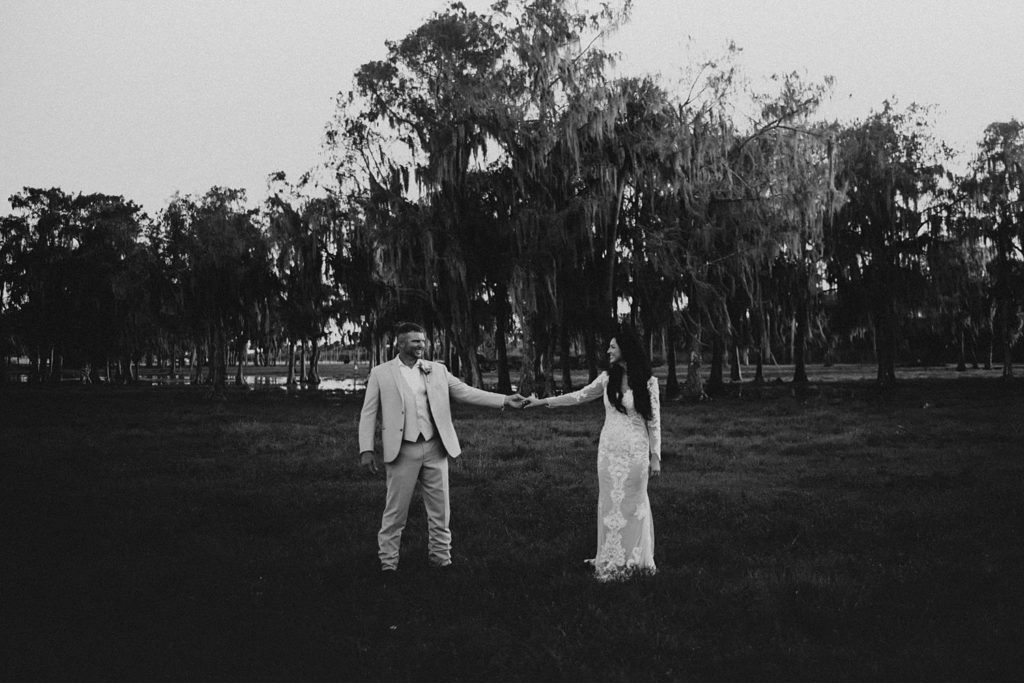 Western-inspired authentic Bride and groom portraits in pasture in okeechobee florida