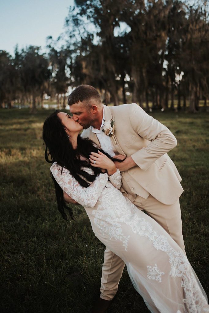 Western-inspired authentic Bride and groom portraits in pasture in okeechobee florida