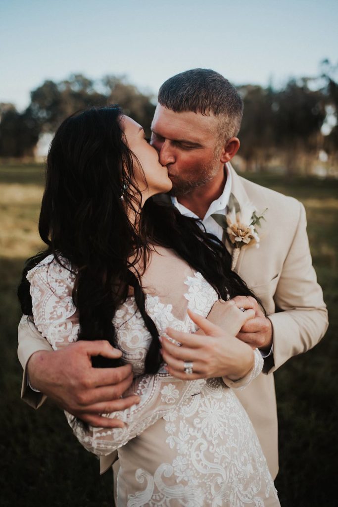 Western-inspired authentic Bride and groom portraits in pasture in okeechobee florida