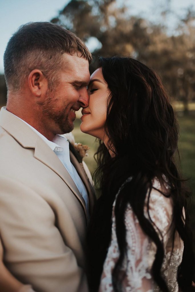 Western-inspired authentic Bride and groom portraits in pasture in okeechobee florida
