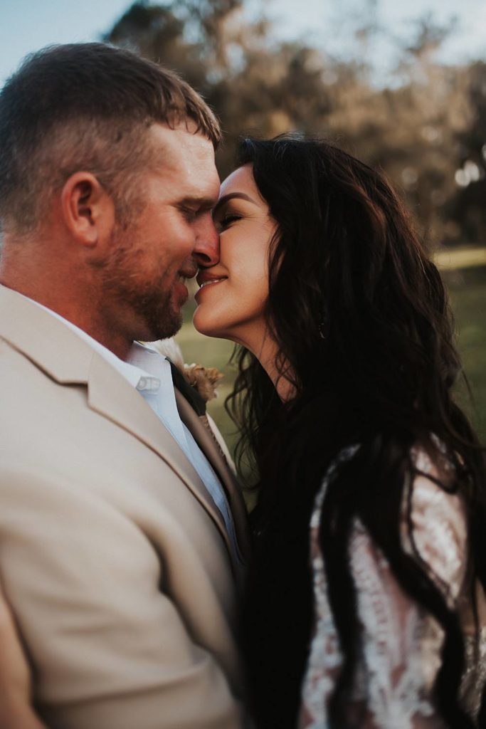 Western-inspired authentic Bride and groom portraits in pasture in okeechobee florida