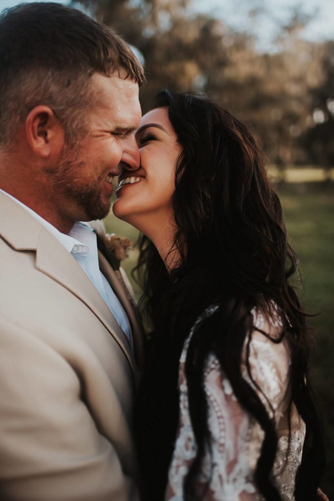 Western-inspired authentic Bride and groom portraits in pasture in okeechobee florida