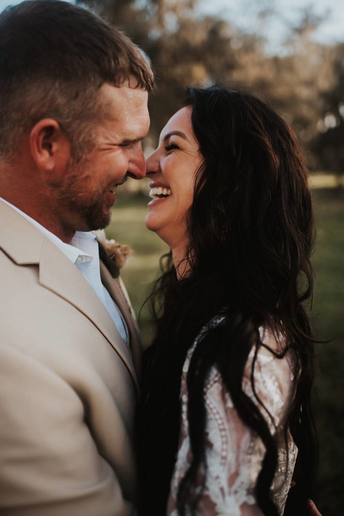 Western-inspired authentic Bride and groom portraits in pasture in okeechobee florida
