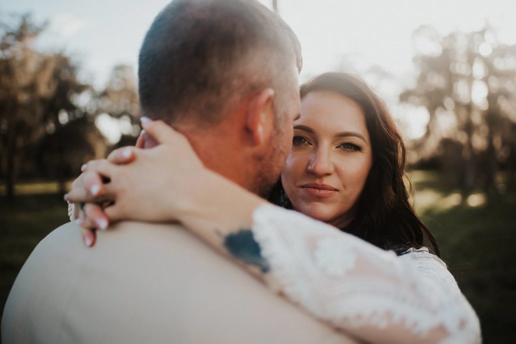Western-inspired authentic Bride and groom portraits in pasture in okeechobee florida