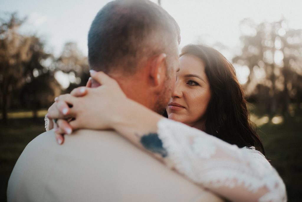 Western-inspired authentic Bride and groom portraits in pasture in okeechobee florida