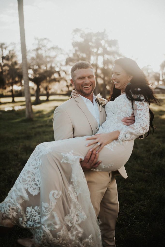 Western-inspired authentic Bride and groom portraits in pasture in okeechobee florida