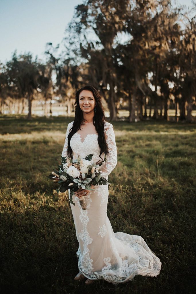 Western-inspired bridal portraits in pasture in okeechobee florida