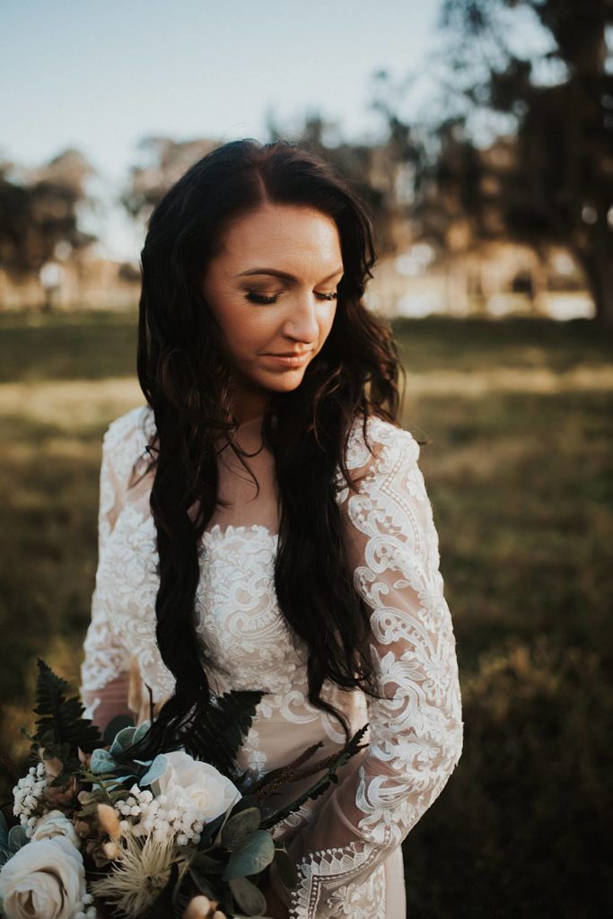 Western-inspired bridal portraits in pasture in okeechobee florida