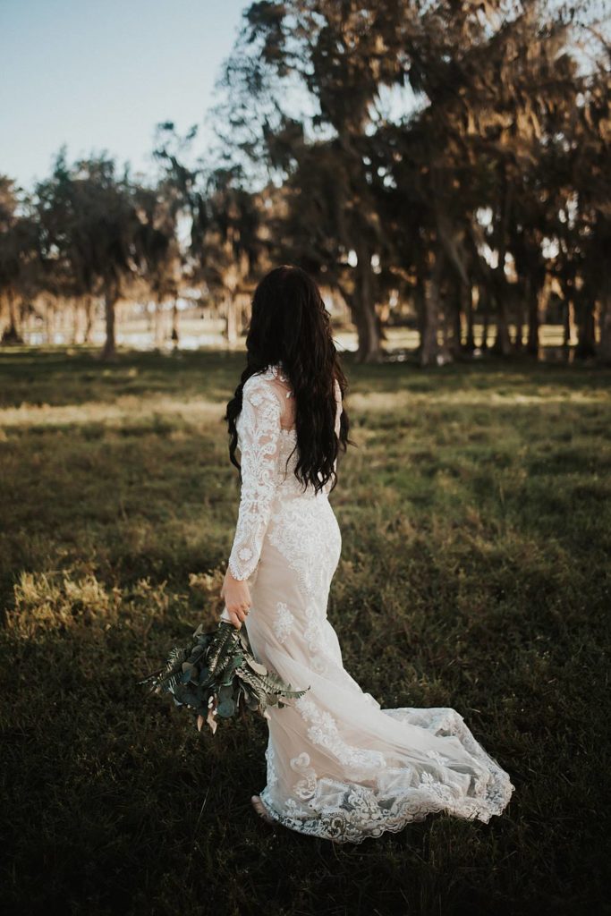 Western-inspired bridal portraits in pasture in okeechobee florida