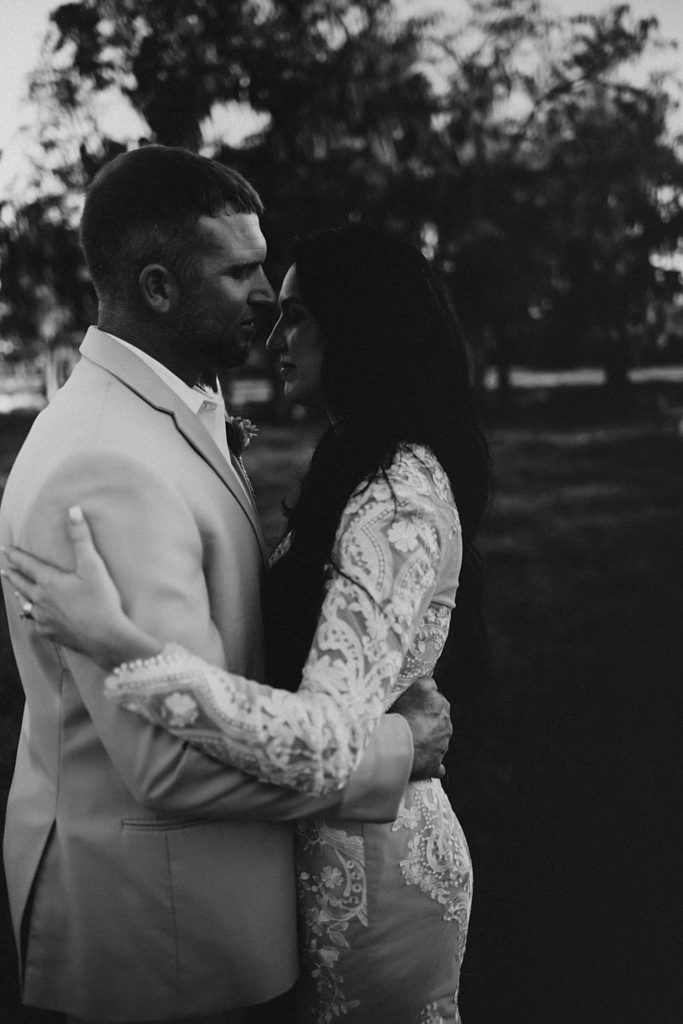 Western-inspired authentic Bride and groom portraits in pasture in okeechobee florida