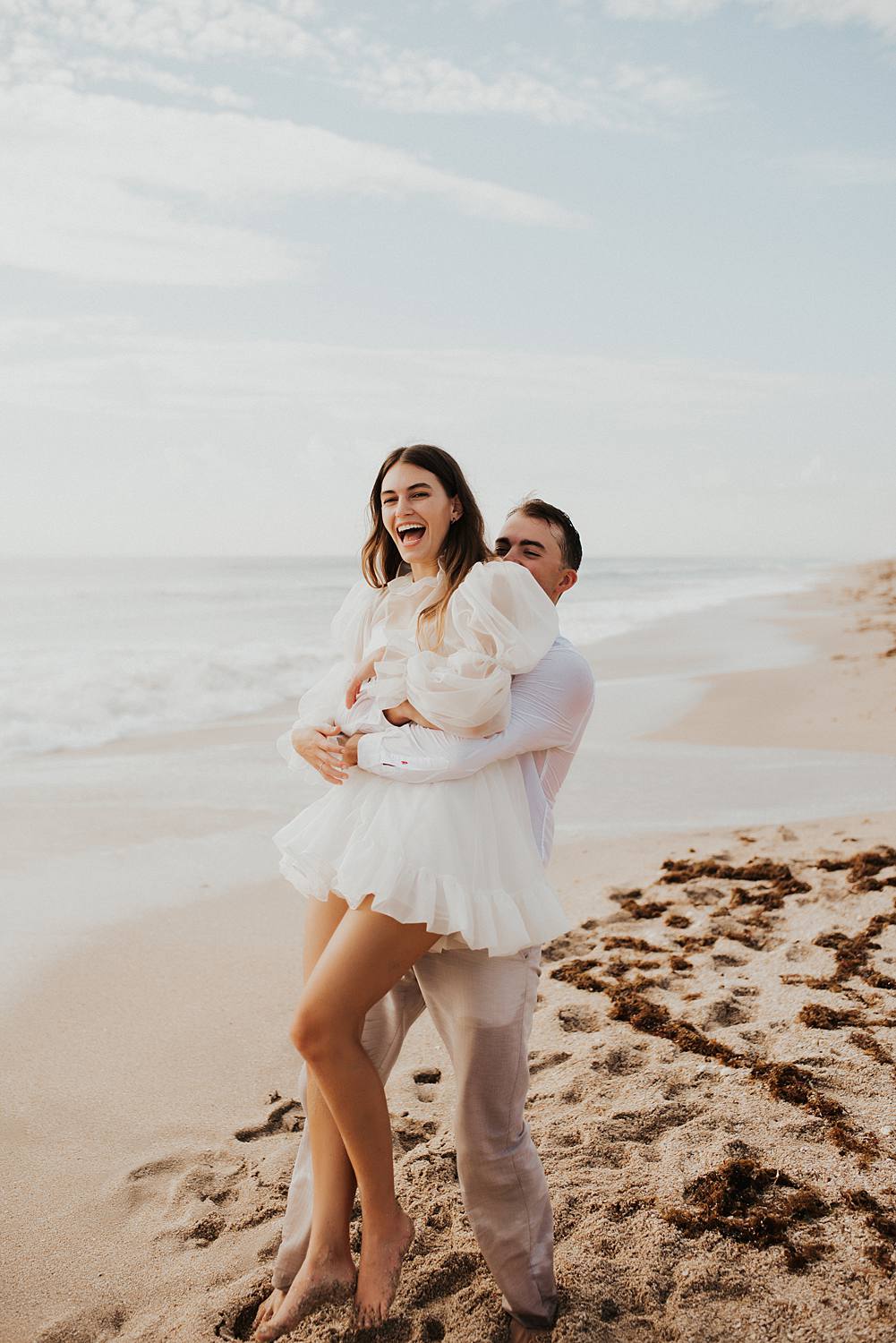 Bride and groom elopement on beach