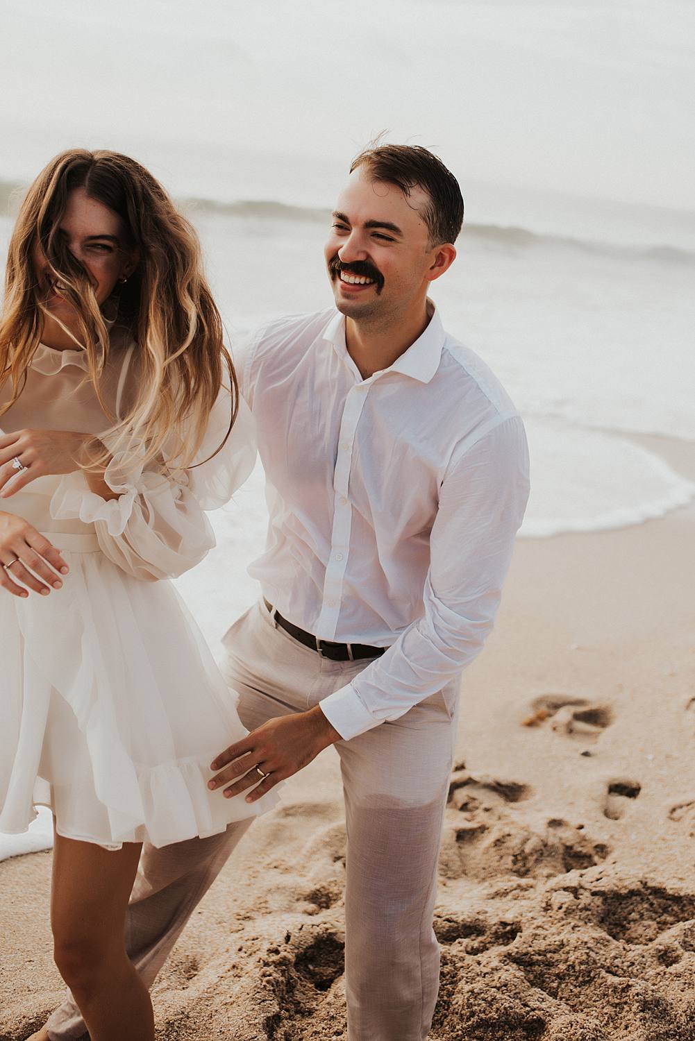 Bride and groom elopement on beach