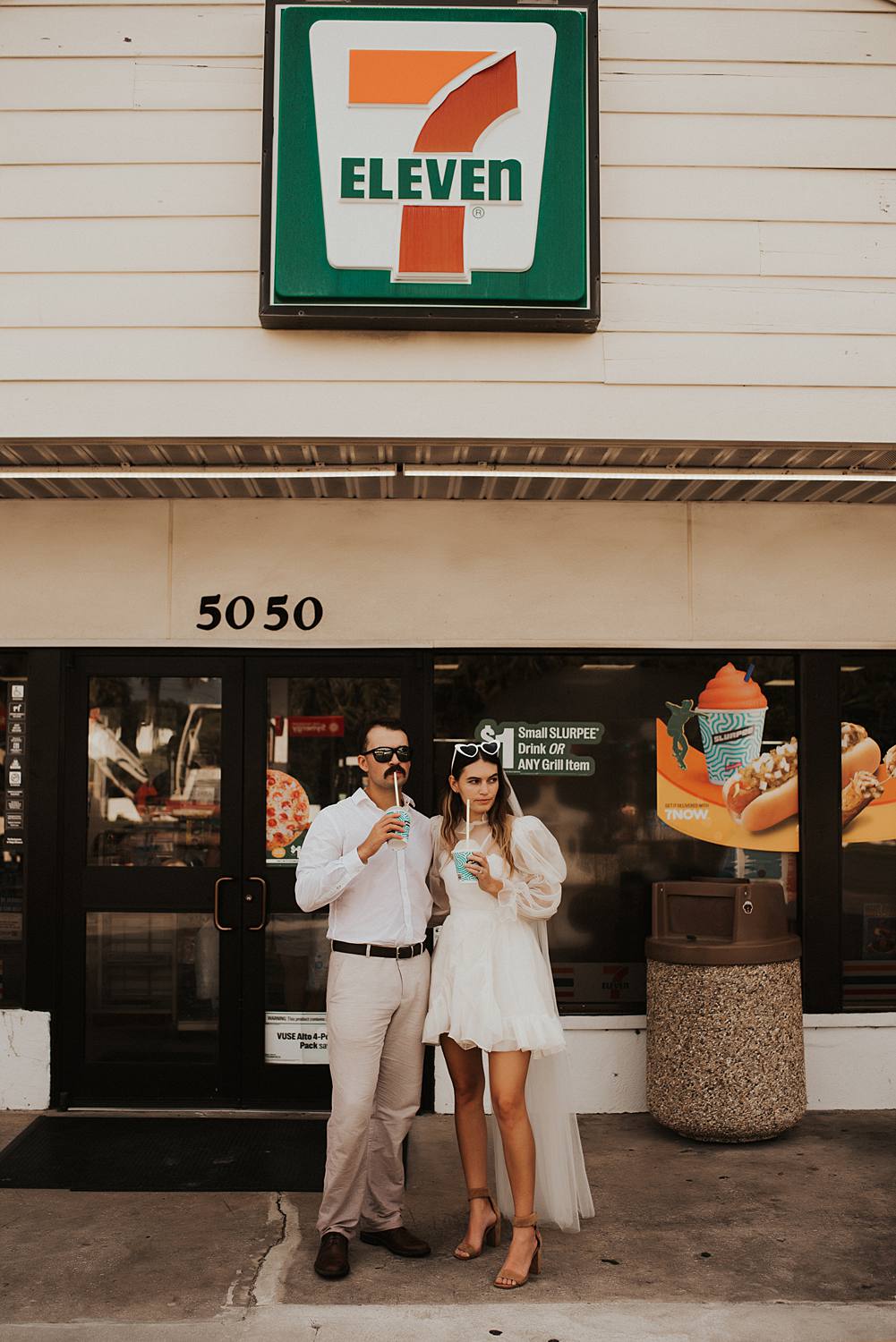 Bride and groom drinking slurpees at 7 eleven