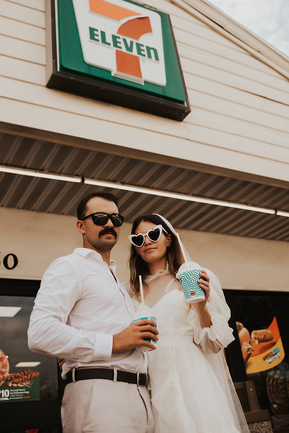 Bride and groom drinking slurpees at 7 eleven