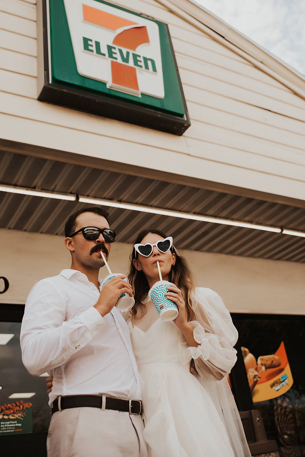Bride and groom drinking slurpees at 7 eleven
