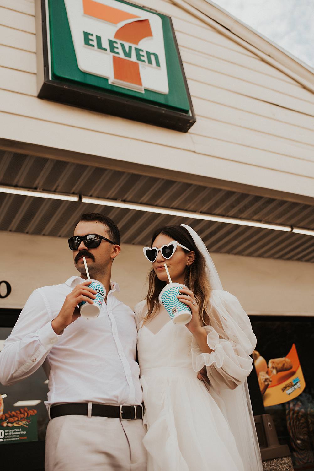 Bride and groom drinking slurpees at 7 eleven