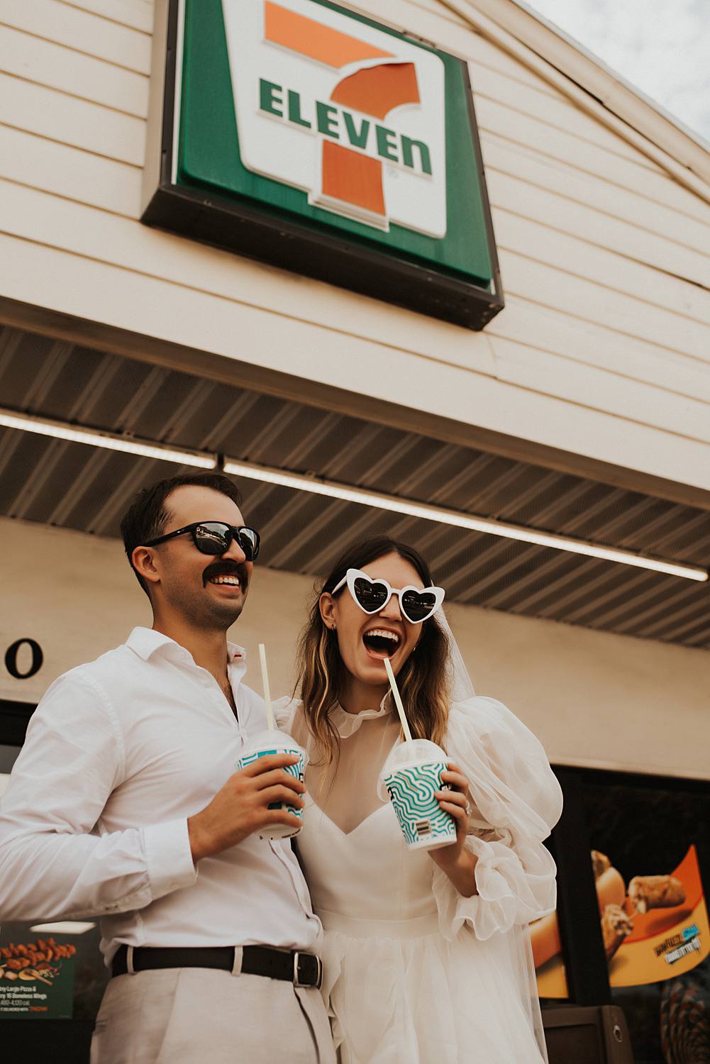Bride and groom drinking slurpees at 7 eleven