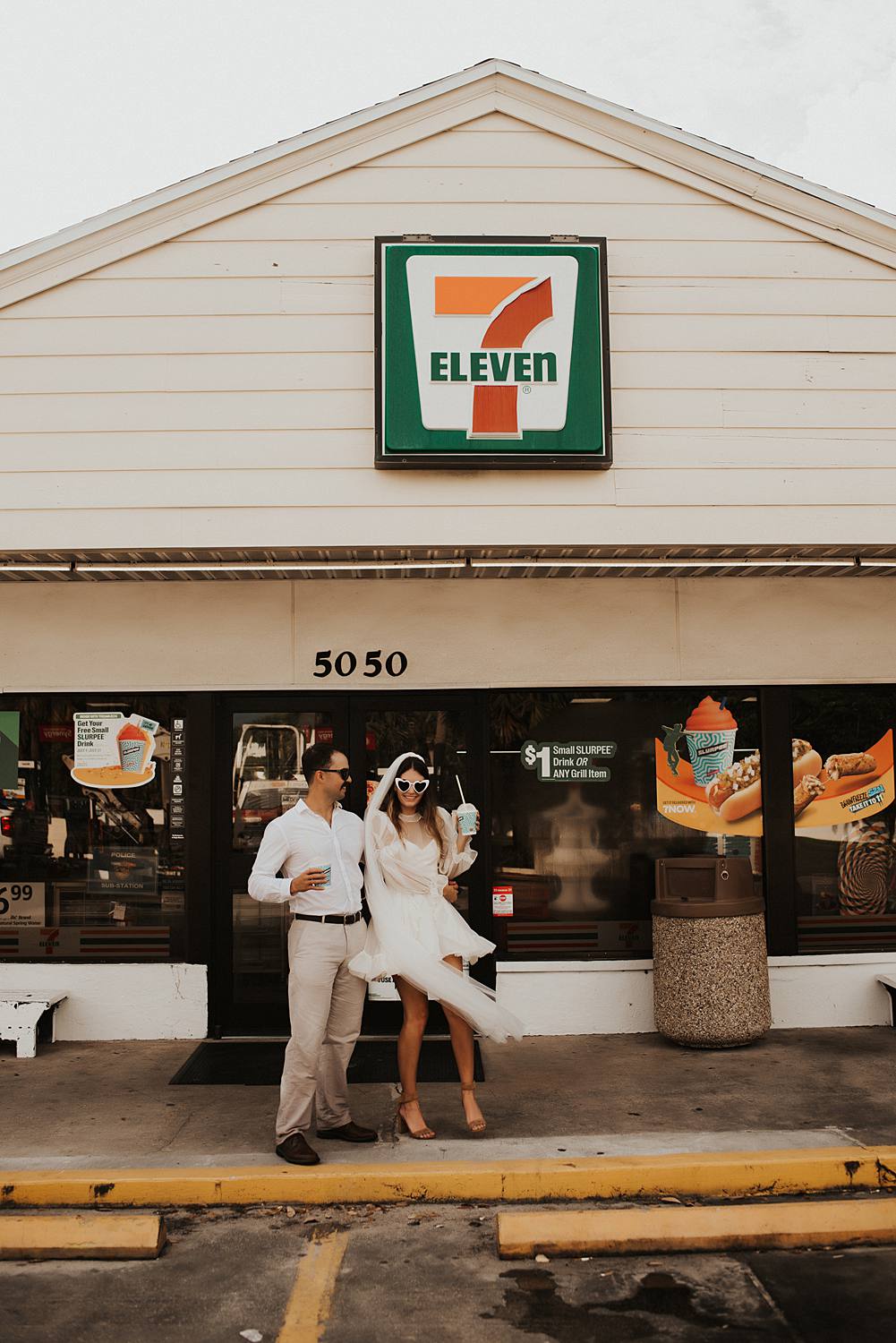 Bride and groom drinking slurpees at 7 eleven