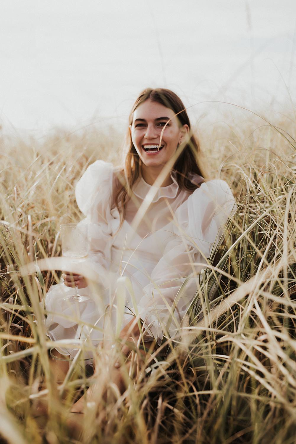 Bridal portrait in tall beach grass