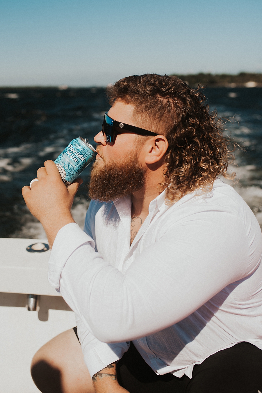 Groom drinking Florida Man from Cigar City during elopement