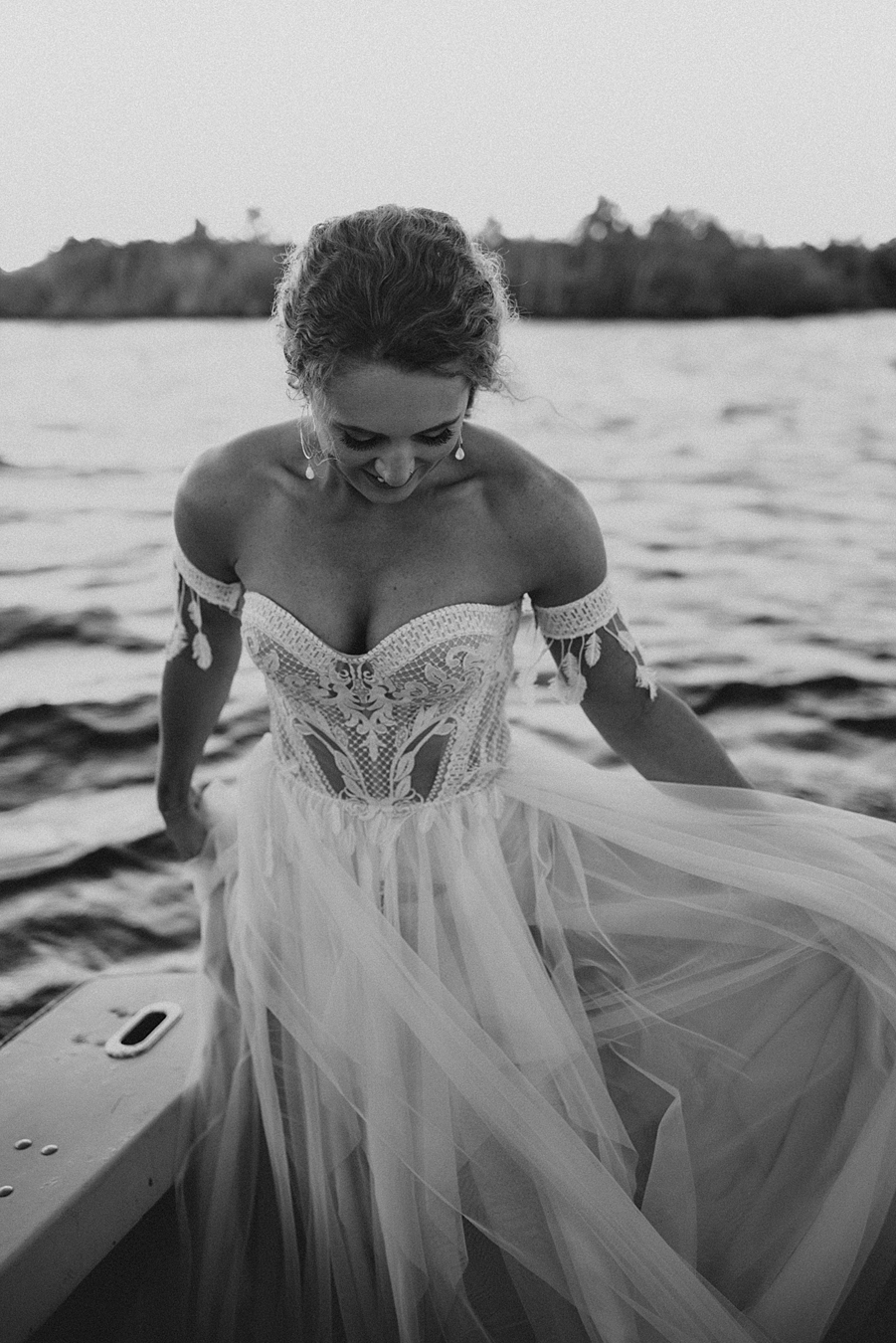 Bride in corset dress and arm cuffs