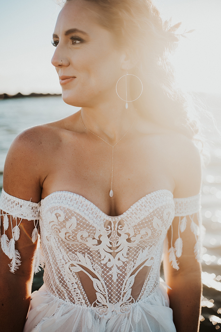 Strapless, lacy corset dress and simple jewelry