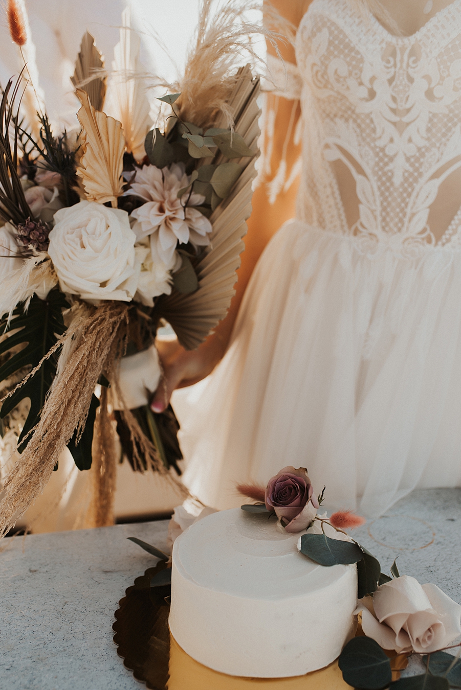 Simple elopement cake with greenery