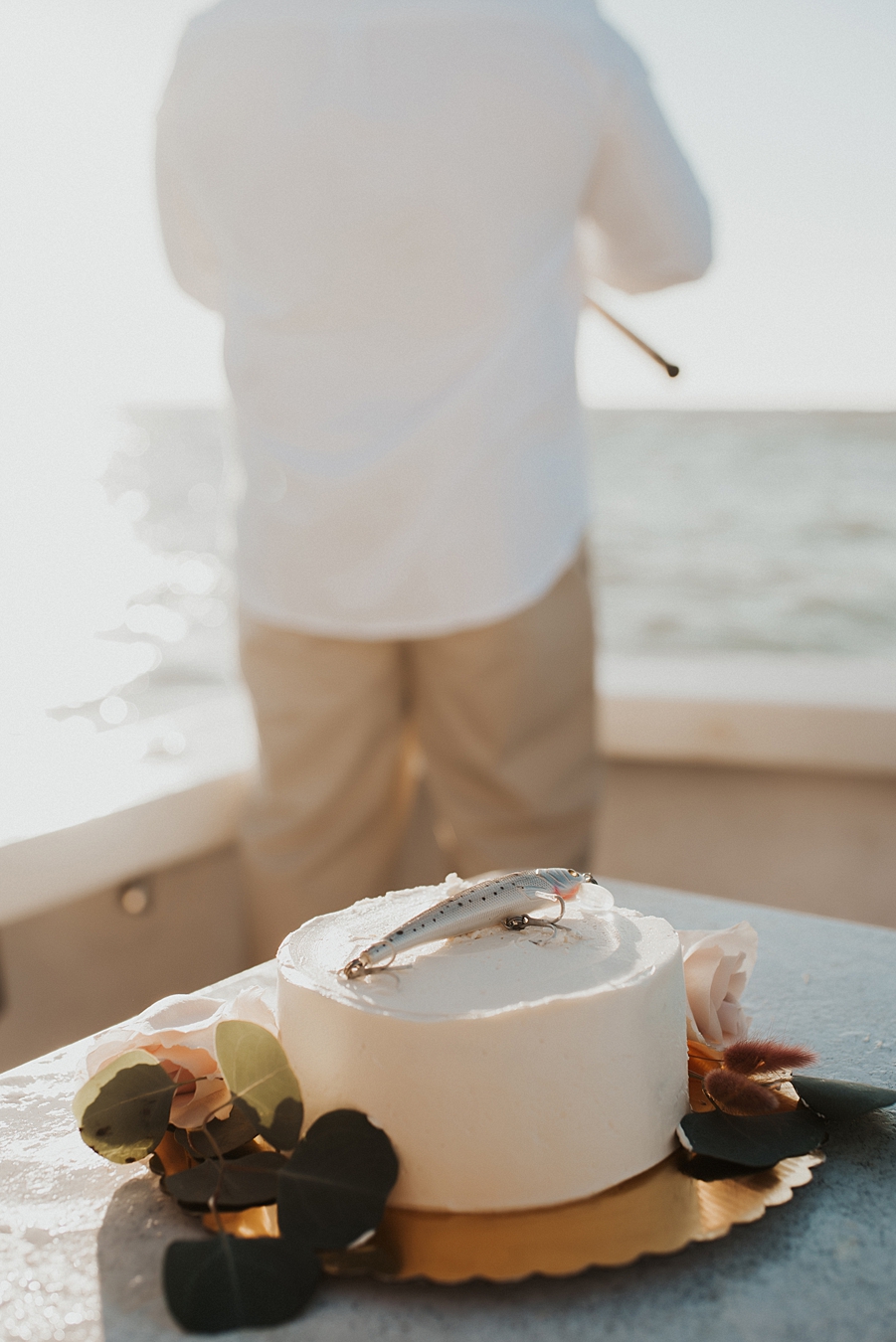 Simple elopement cake with fishing lure