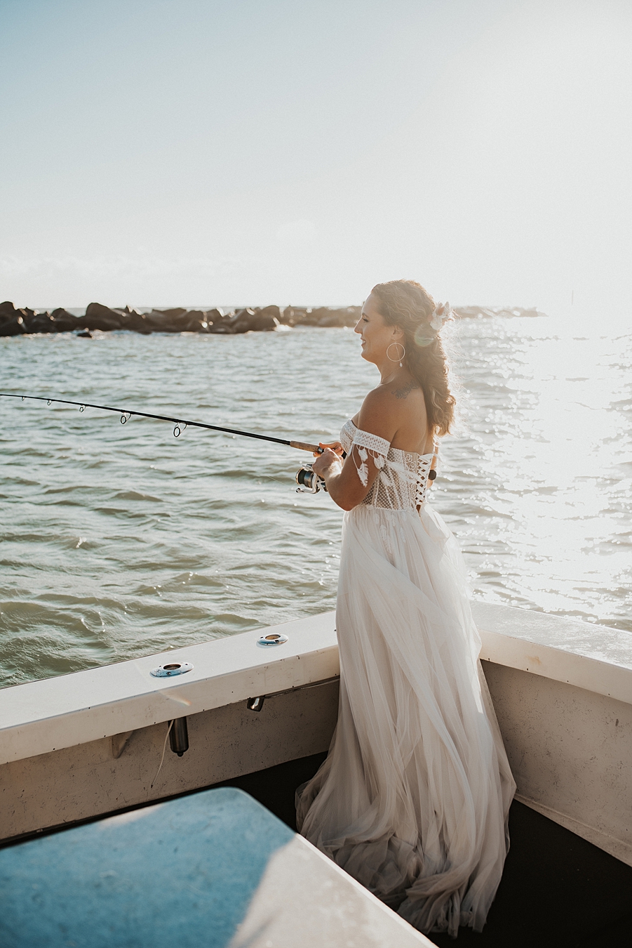 Bride fishing on boat