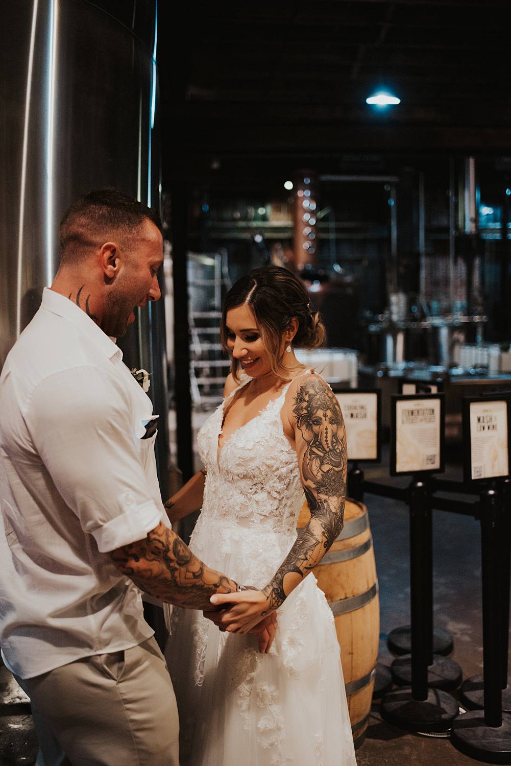 Bride and groom dancing at Saint Augustine Distillery