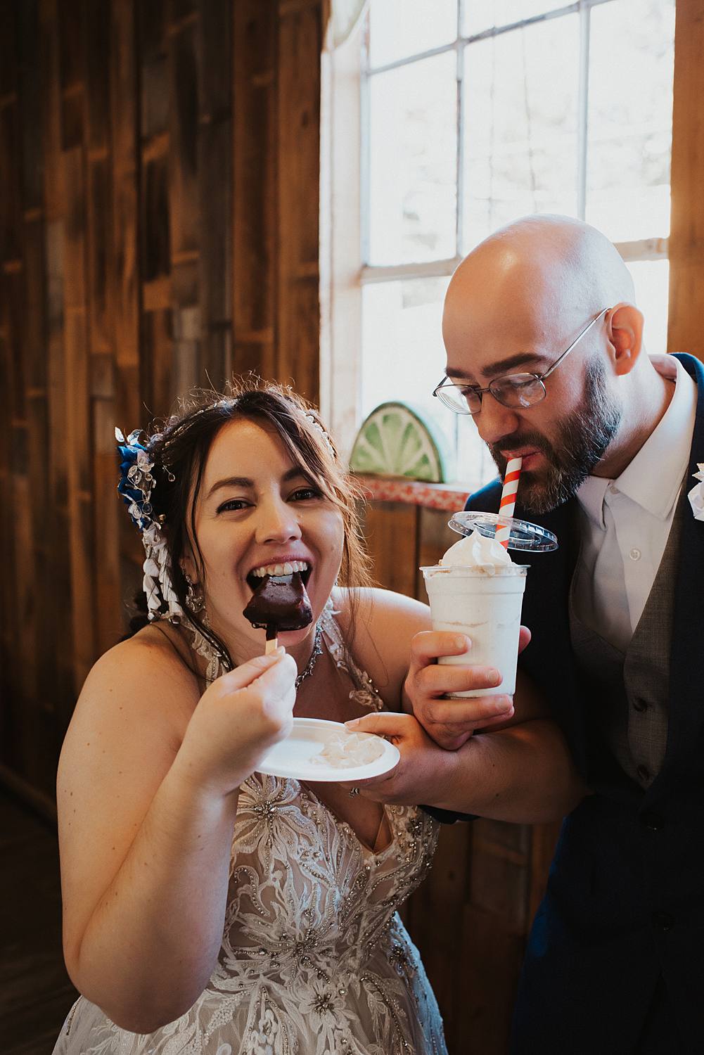 Couple sharing key lime pie desserts after their key west elopement 