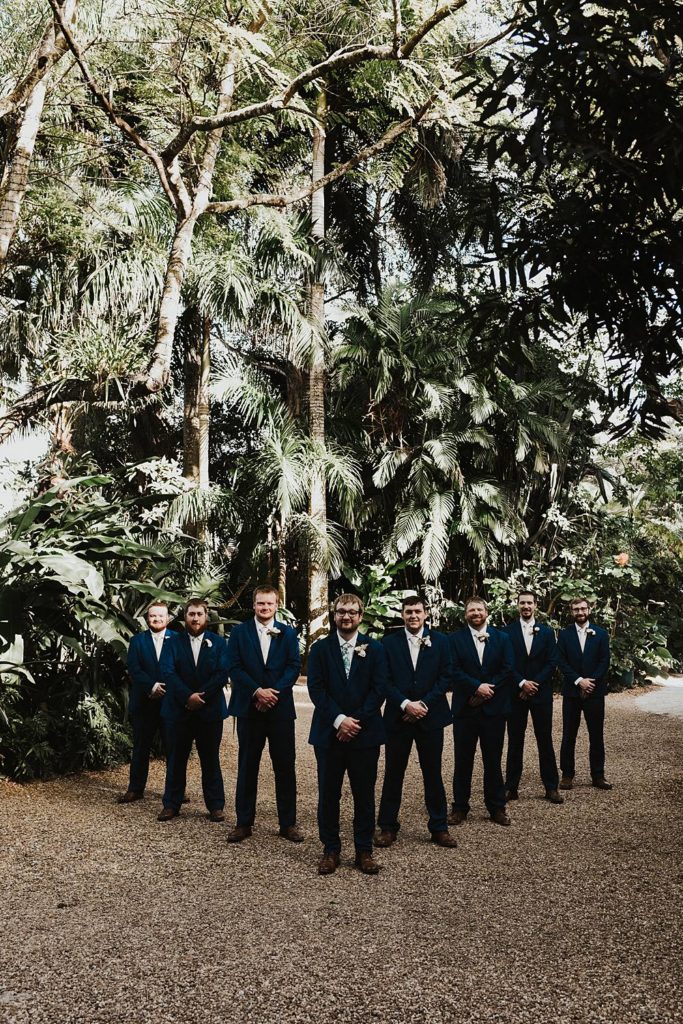 Tropical bridal party portrait at the historic walton house in homestead florida